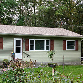 1 story home with new siding and windows